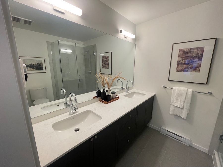 Completed double vanity with marble countertop and chrome fixtures, Vancouver bathroom renovation by ARSuperfix